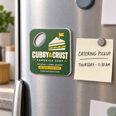 Sandwich Shop custom logo bottle opener magnet - held on a refrigerator door by its magnetic back