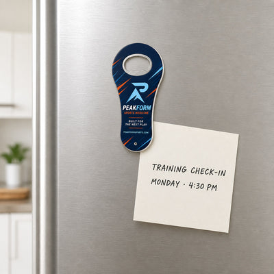 Sports Medicine Clinic custom logo bottle opener magnet - held on a refrigerator door by its magnetic back