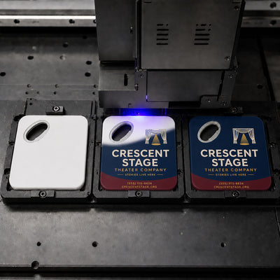 Theater Company custom logo bottle opener magnet - close-up of the UV printed logo