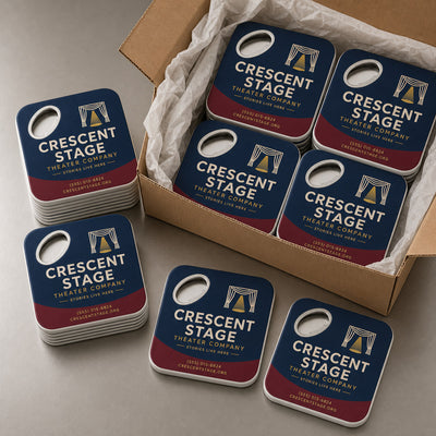 Theater Company custom logo bottle opener magnet - bulk order laid out before packing