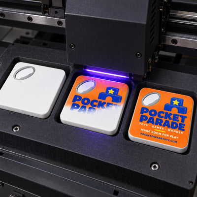 Toy Store custom logo bottle opener magnet - close-up of the UV printed logo