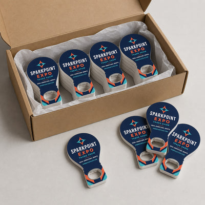 Trade Show Giveaway custom logo bottle opener magnet - bulk order laid out before packing
