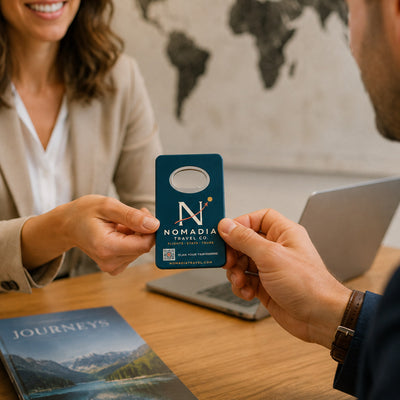 Travel Agency custom logo bottle opener magnet - handed to a customer