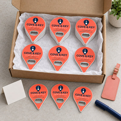 Vacation Rental Welcome custom logo bottle opener magnet - bulk order laid out before packing