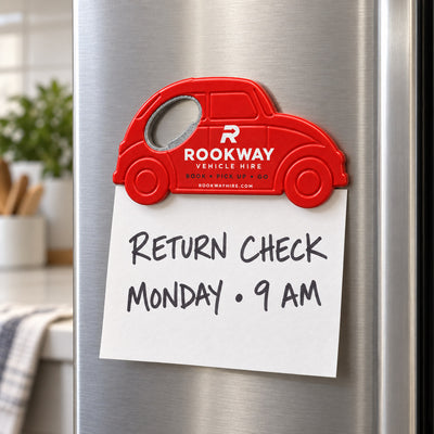 Vehicle Rental custom logo bottle opener magnet - held on a refrigerator door by its magnetic back
