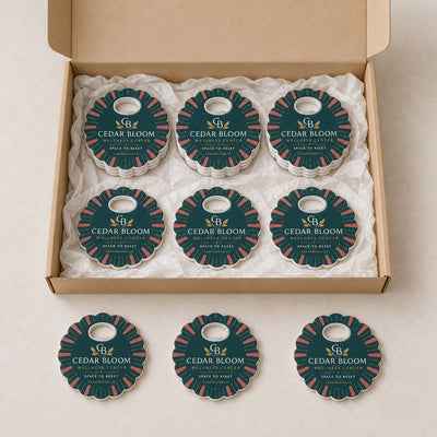 Wellness Center custom logo bottle opener magnet - bulk order laid out before packing